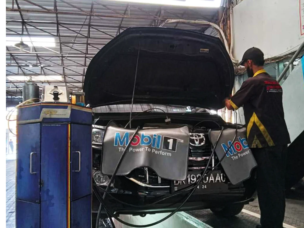 ganti oli mobil dengan mesin flushing